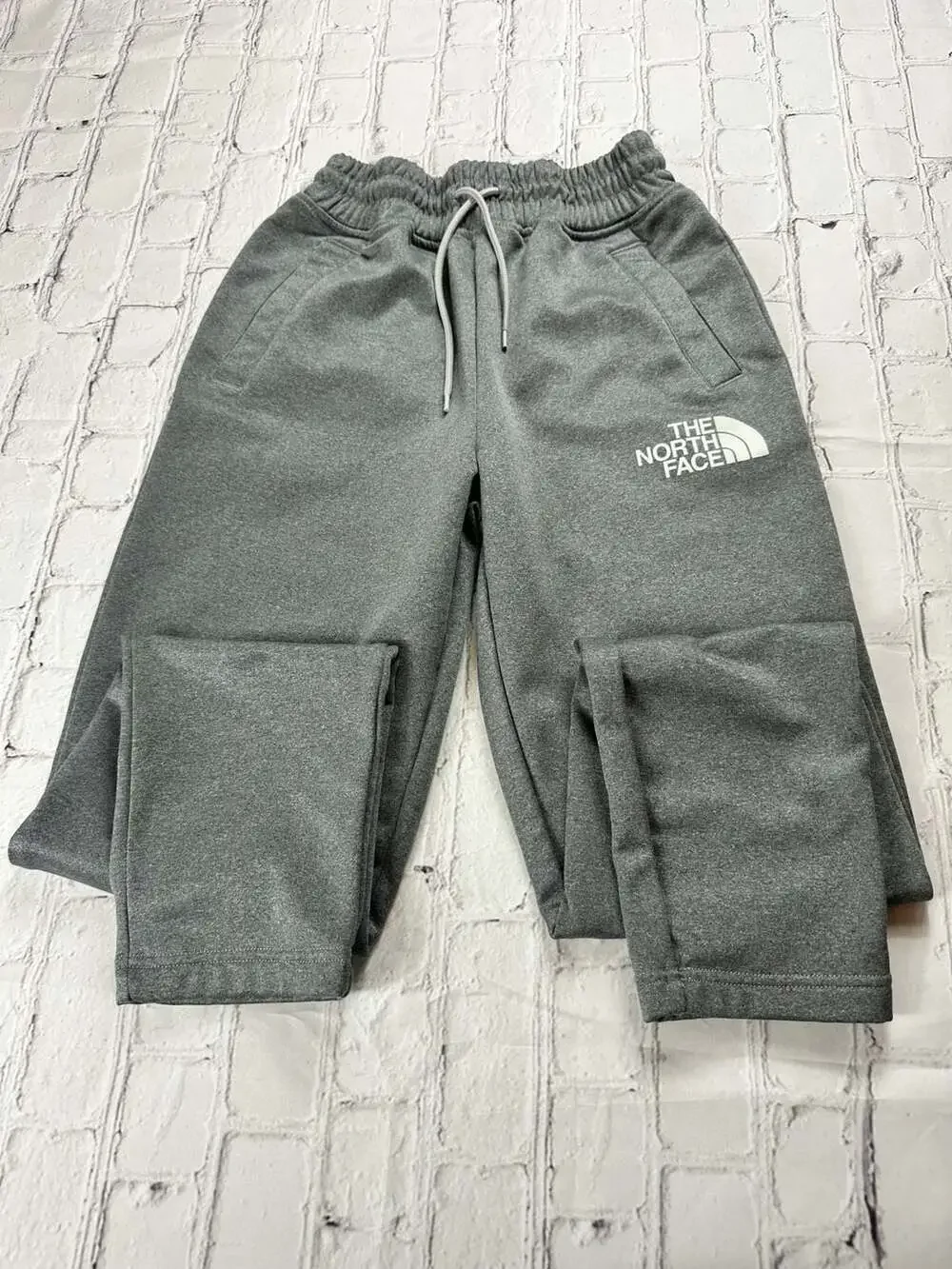 The North Face Mountain Athletics Fleece Jogger Sweatpants in Gray